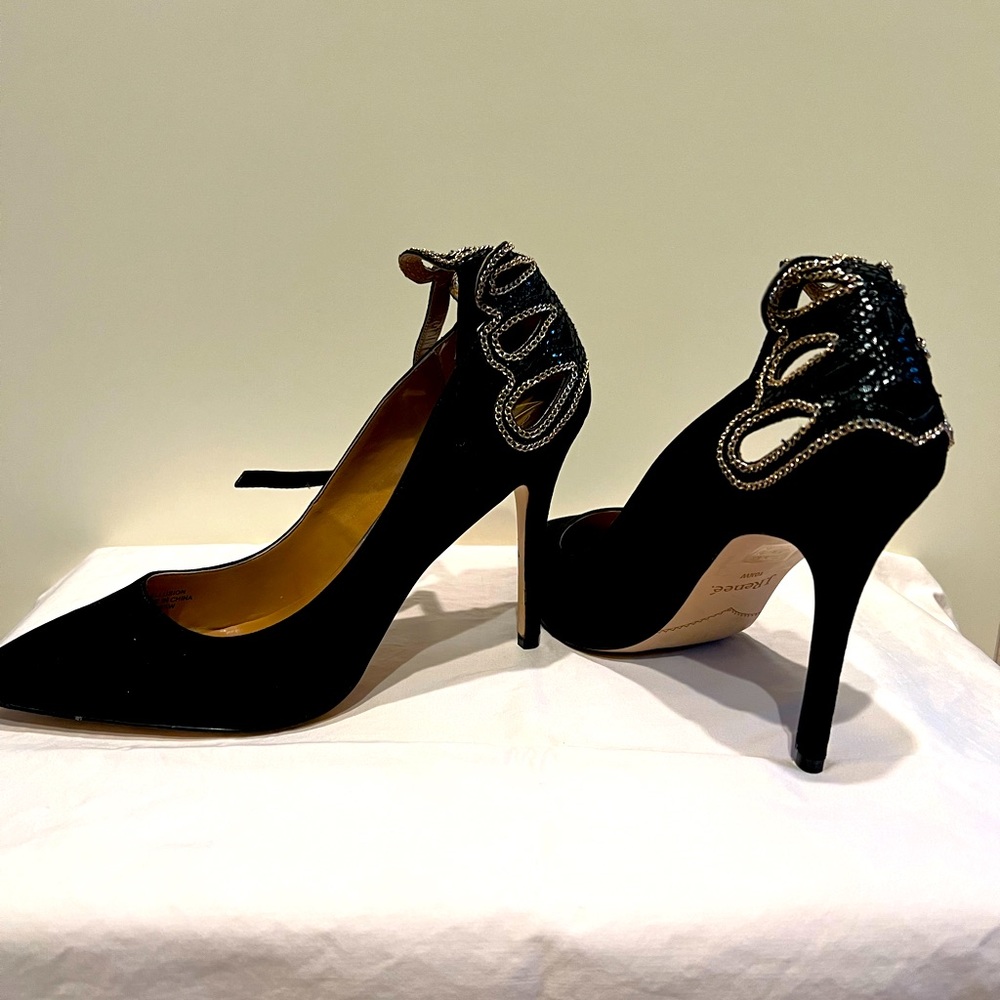 Black suede heels with gold detailing